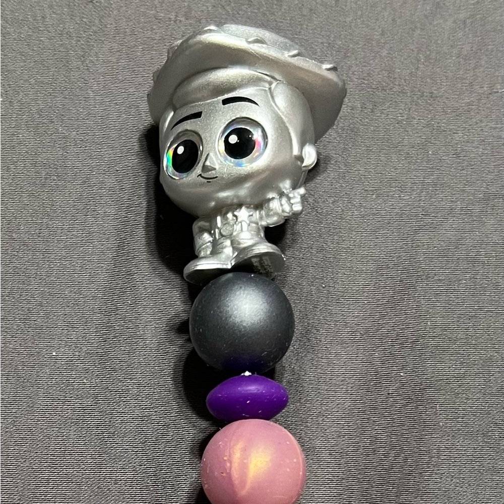 Purple and Pink with Disney 100 Sliver Woody Doorable